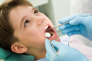 Children visiting the dentist - euro white